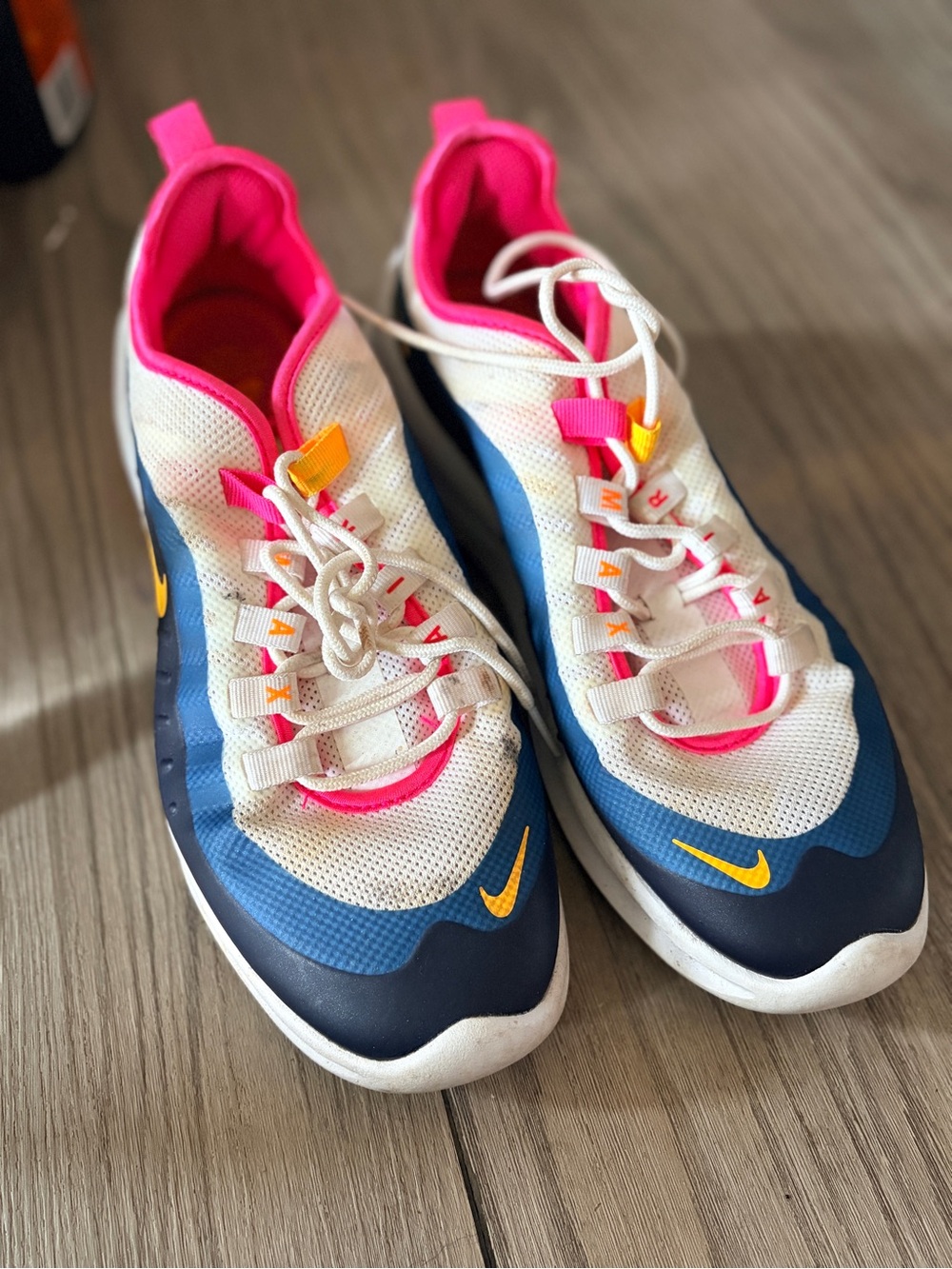 Nike Women’s White, Blue & Pink Sneakers with Yellow Swoosh